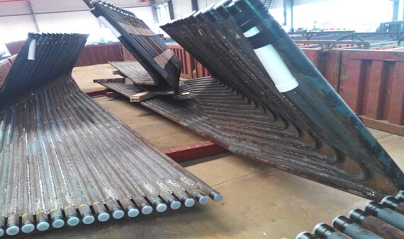 膜式水冷壁管排|材質：SA-210C規(guī)格：63.5×7.5 4根一排，鱗片寬度12.7mm厚度6mm管排總長度12米，內螺紋8個頭） 管材需正偏差，帶500米密封